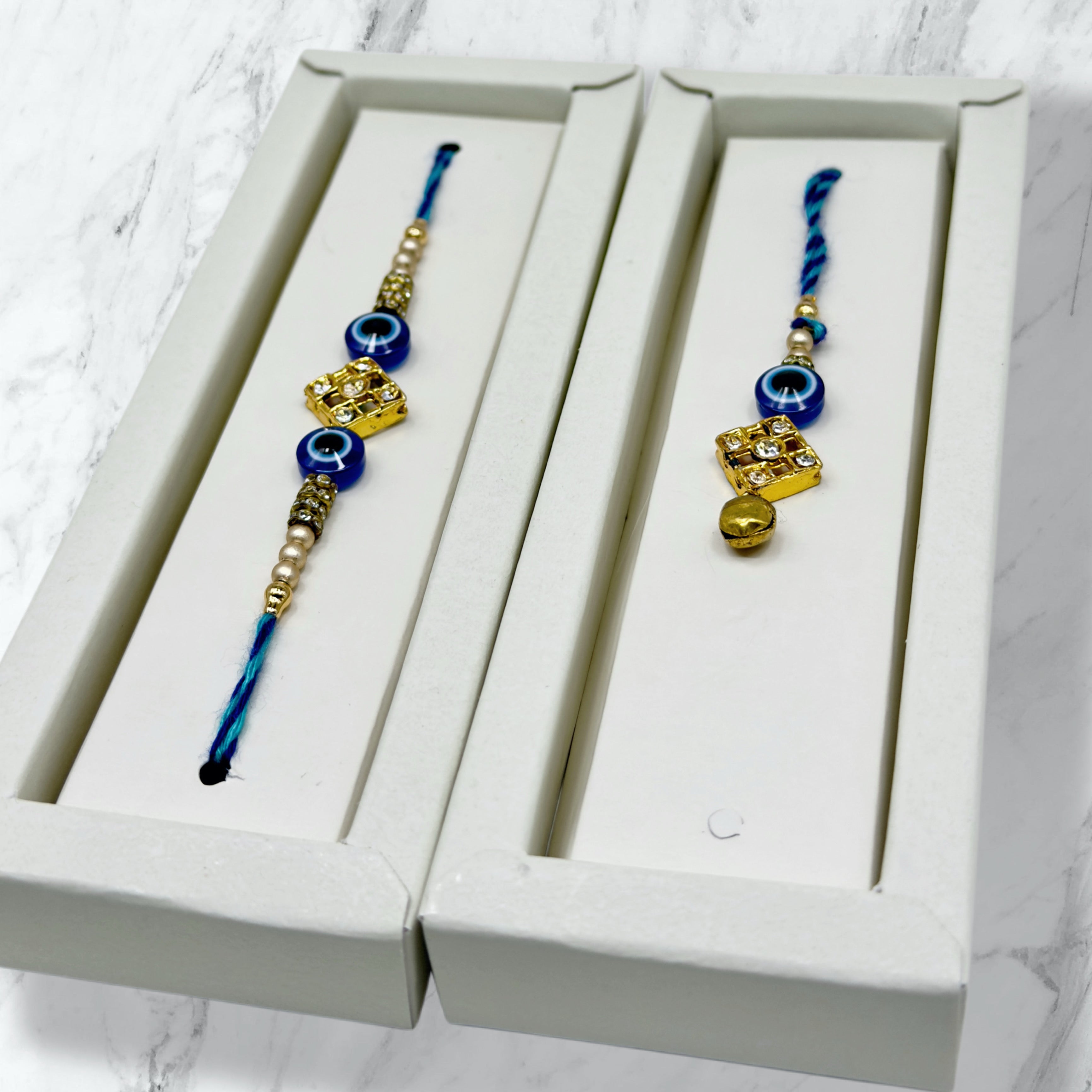 Nazar Battu & Kundan Bhaiya Bhabhi Rakhi Set