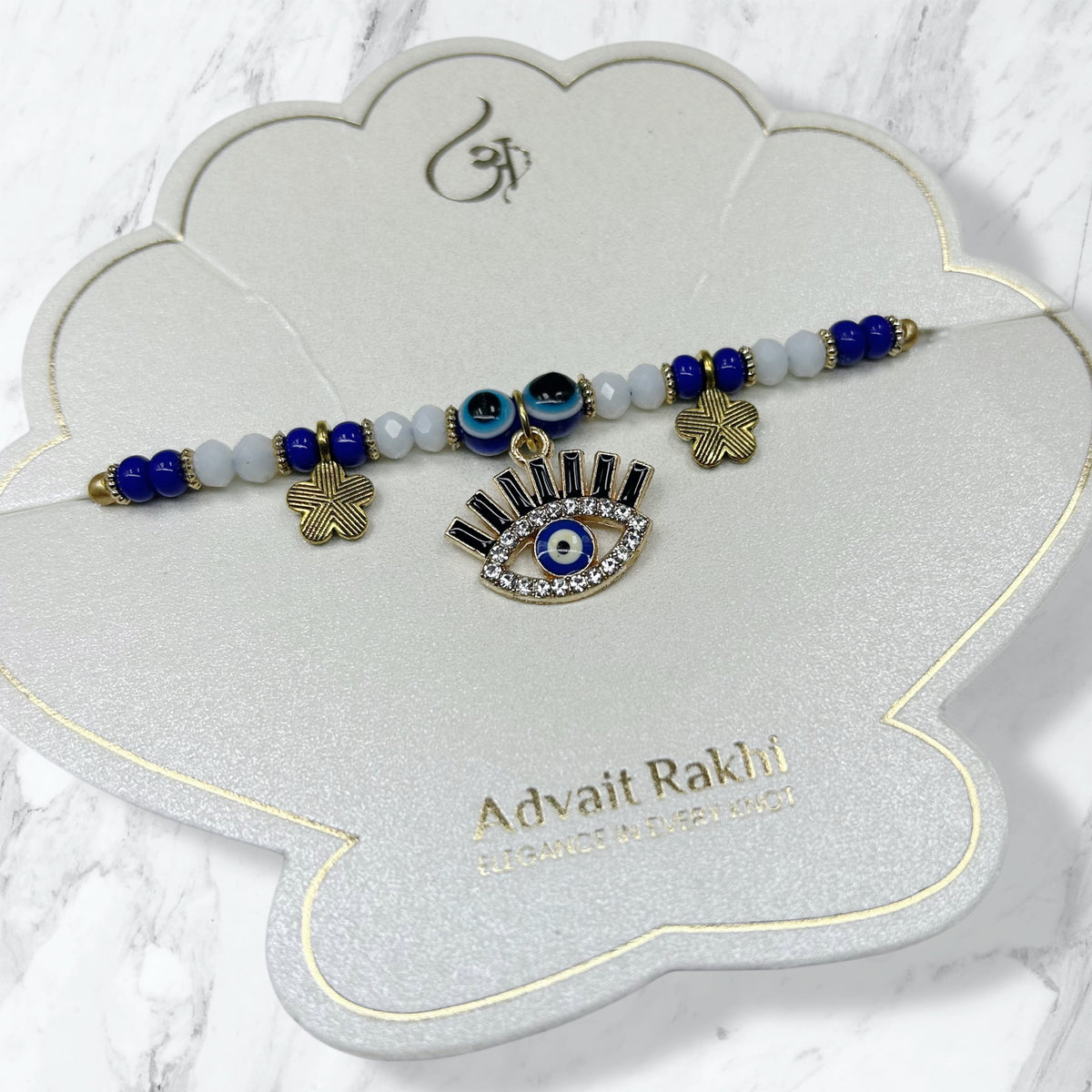 Evil Eye Eyelash Charm & Flower Bead Rakhi