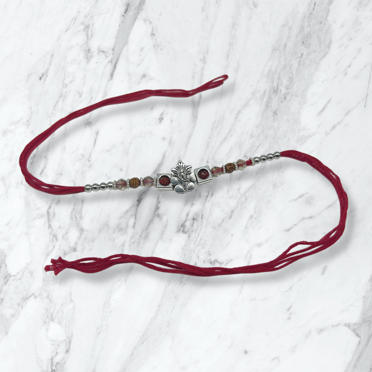 Silver Ganesha & Rudraksha Resham Rakhi