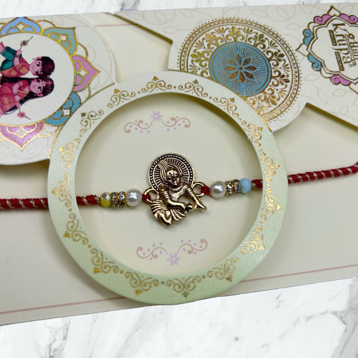 Antique Bal Krishna & Moti Resham Rakhi