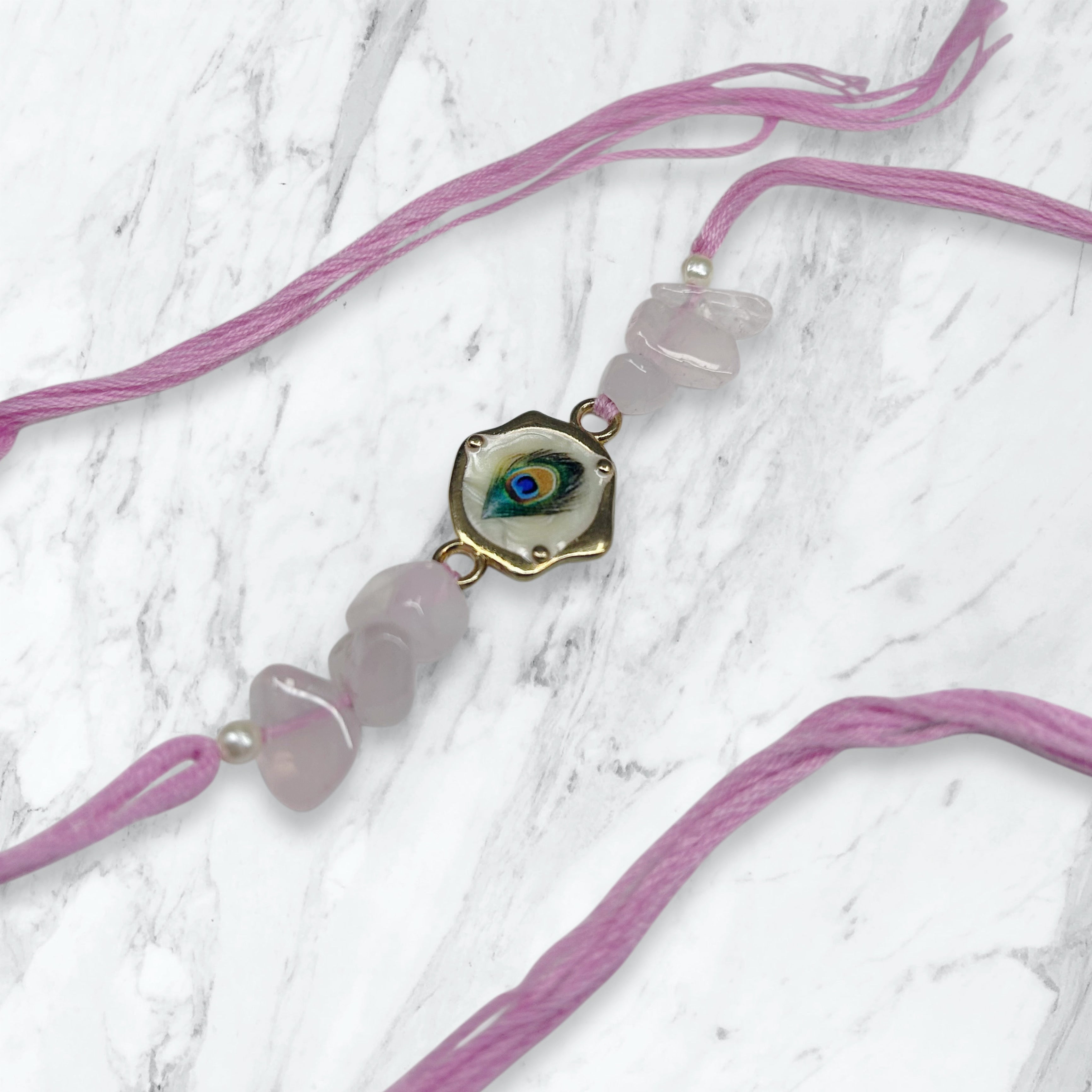 Mayur Pankh & Rose Quartz Bead Resham Rakhi