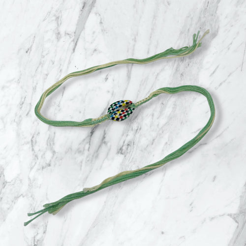 Checkered Kauri Shell Green Thread Rakhi