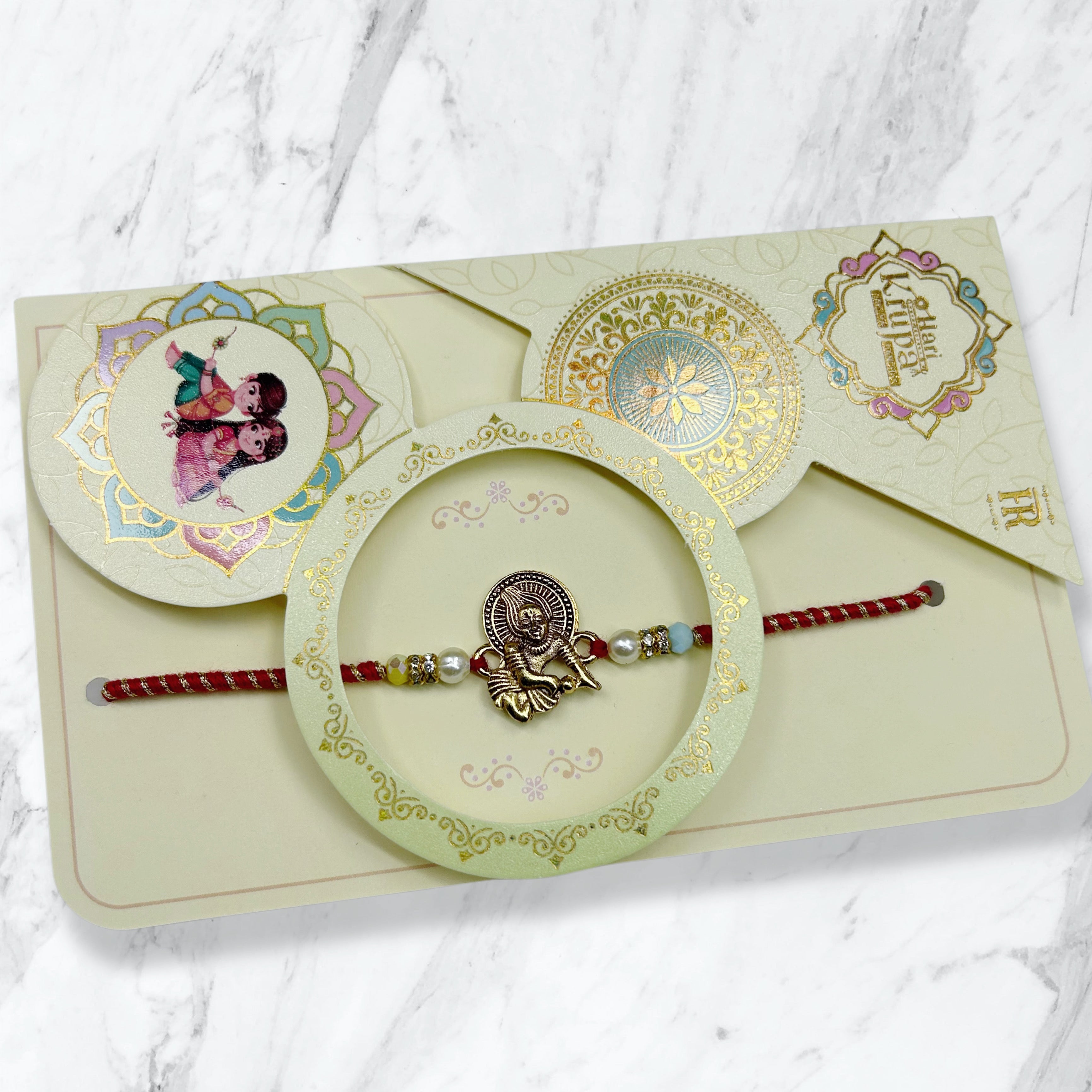 Antique Bal Krishna & Moti Resham Rakhi