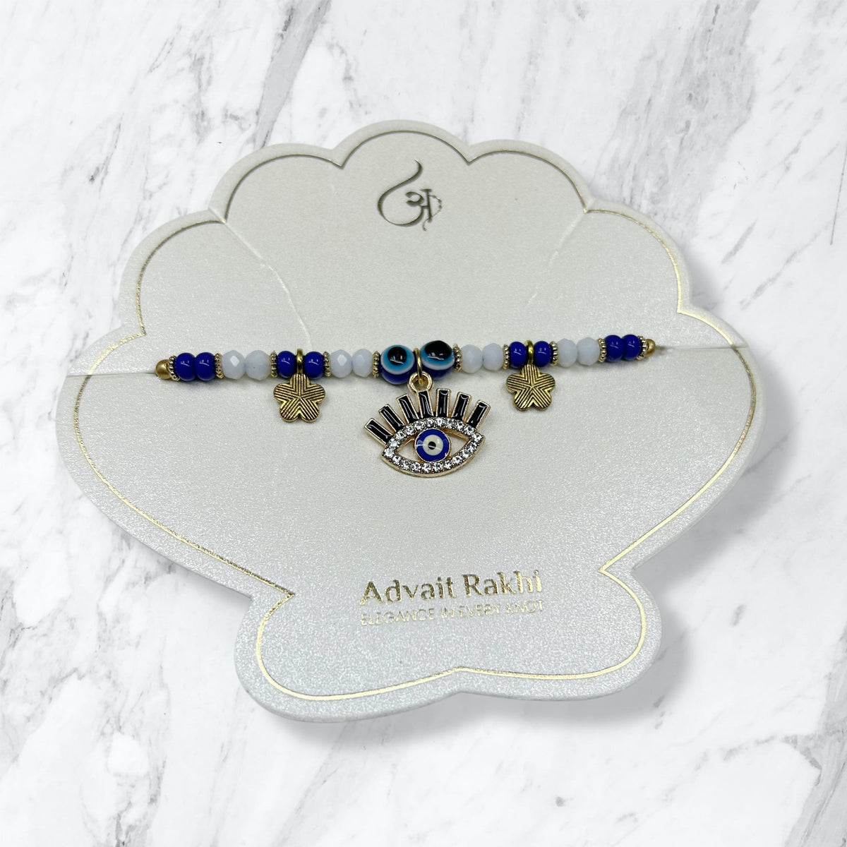 Evil Eye Eyelash Charm & Flower Bead Rakhi