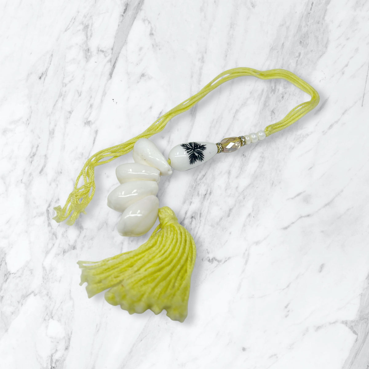 Kauri Shell & Yellow Tassel Lumba Rakhi