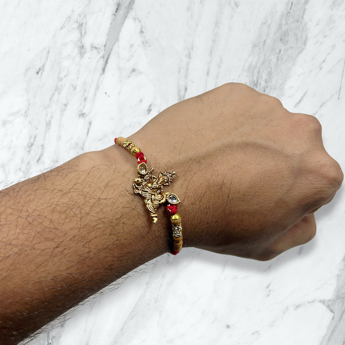 Ganesha Kundan Resham Rakhi