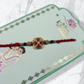 Floral Meenakari & Blue Bead Resham Rakhi